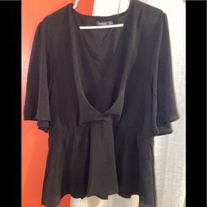 Black peplum shirt size: 16